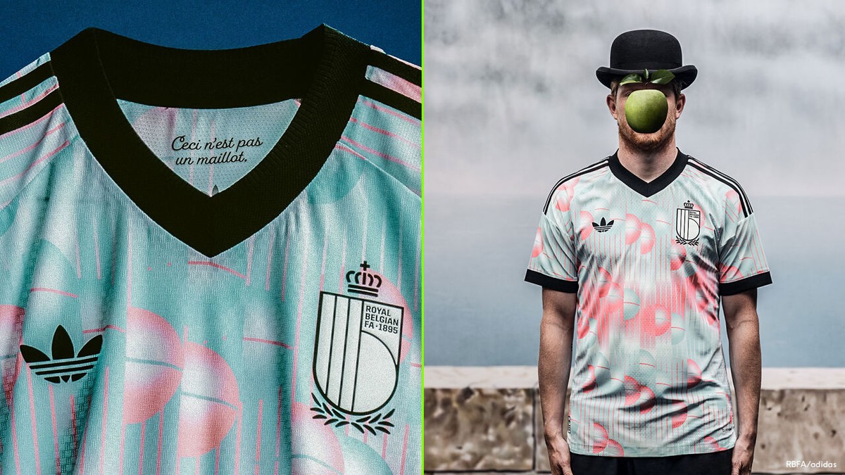 Retrodesign met lichtblauwe en roze tinten en eerbetoon aan Magritte: dit is het nieuwe uitshirt van de Rode Duivels voor het WK
