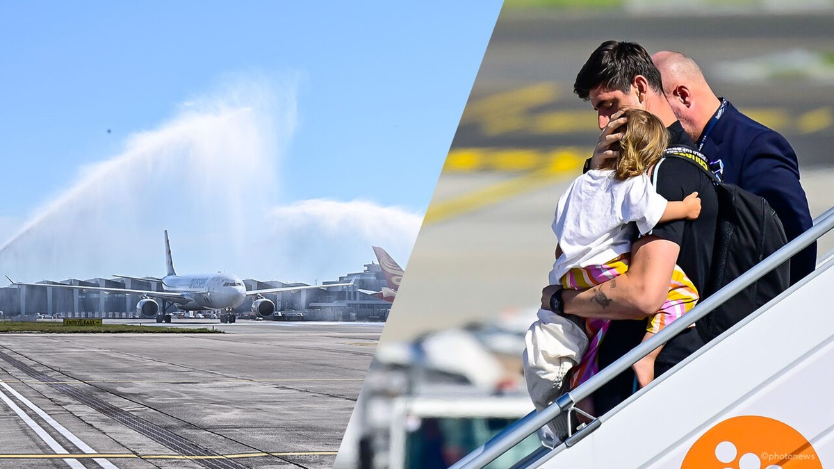 LIVE - Courtois met z'n kleinste in de armen: Rode Duivels samen geland in Zaventem, met "water salute" van de brandweer